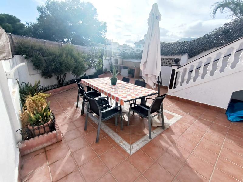 Foto c78235ef-55f5-47ff-9eb8-3c75478f5d06. Casa adossada amb xemeneia aparcament a Montemar Torremolinos