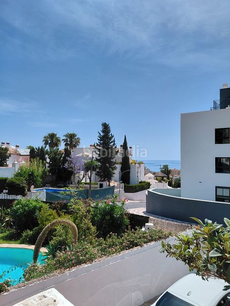 Foto bce9bfee-9bc1-4b9e-b03a-7fc5f851c263. Casa adossada amb aparcament a Montemar Torremolinos