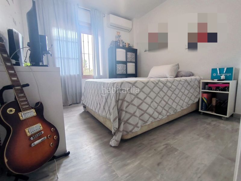 Foto b70d34fa-bbc3-4fb4-8c25-e740b39b3385. Casa adossada amb aparcament a Montemar Torremolinos