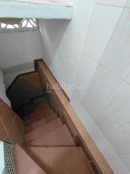 Foto 58f0f81f-6471-4e45-a955-fd507353d4df. Casa aparellada amb aparcament a Centro Mijas