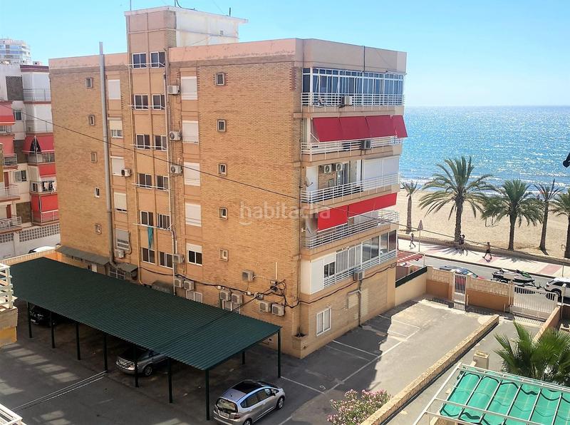 Foto 1068448f-bcd5-4cf8-8dd3-1a6c18b021f6. Piso apartamento frente al mar con garaje en Playa Muchavista Campello (el)