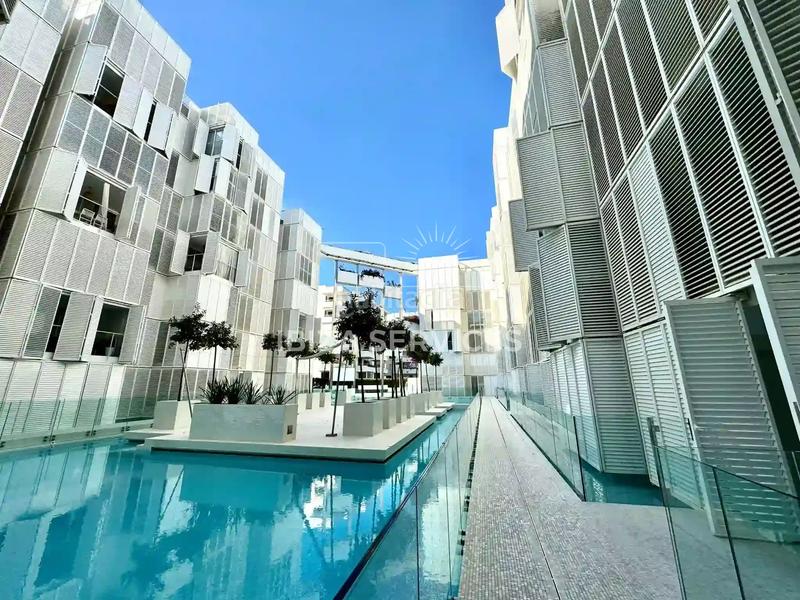 Foto e834e00b-e760-4092-b350-4b7e735a1266. Etagenwohnung mit pool in Marina Botafoc-Talamanca Ibiza