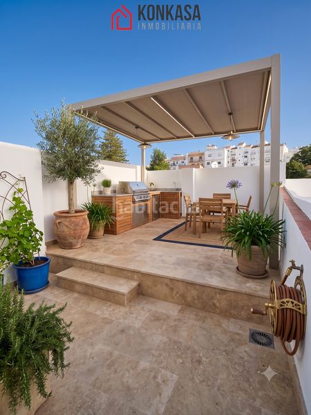 Foto c9547dc7-290b-4f7c-a0b6-fb1affb5ef26. Casa adossada a Arcos de la Frontera