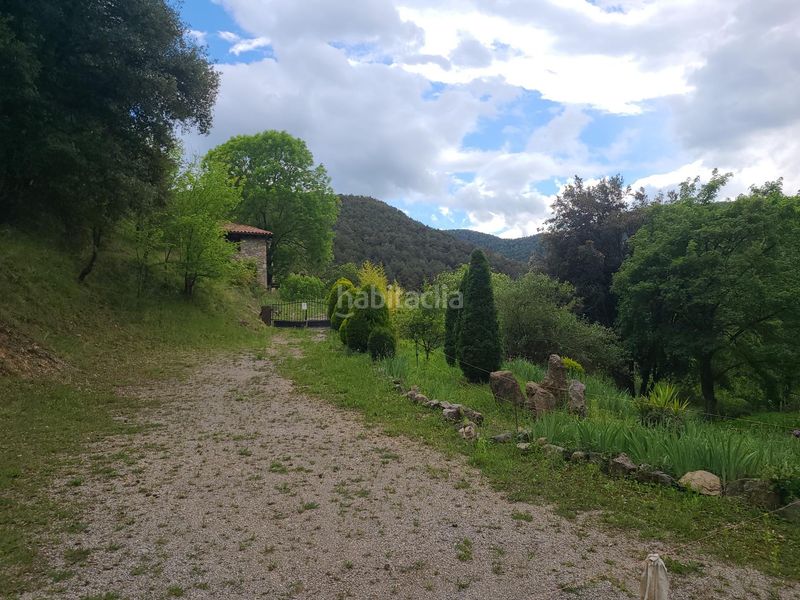 Foto ac1c1b23-e7f0-4d76-9929-0574f6a097dc. Masia a vall de bianya a Sant Joan les Fonts