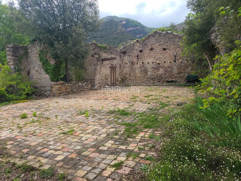Foto e5cdcbf3-5fc7-4054-a536-279b1c6d680e. Masia a vall de bianya a Sant Joan les Fonts