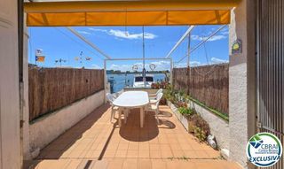 Casa adossada a Cap llarg 23. Exclusiva casa con amarre de 10x4 m y vistas al parque natural,