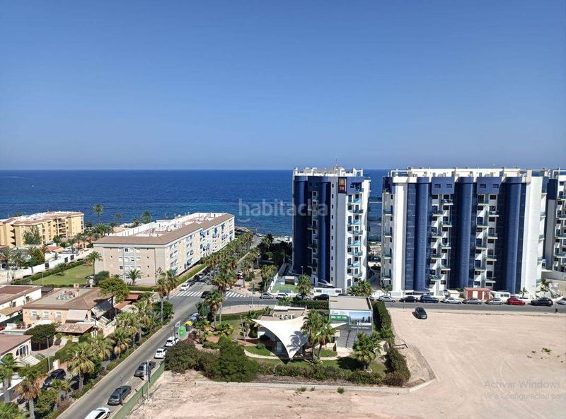 Foto 0a9f3878-e0c2-4985-8e55-97669ac85a88. Apartament amb calefacció aparcament piscina a Punta Prima Torrevieja