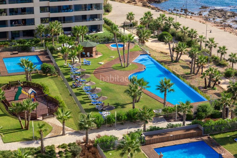 Foto 311cfa34-5d97-43f4-ac77-2876fe171303. Apartament amb calefacció aparcament piscina a Punta Prima Torrevieja