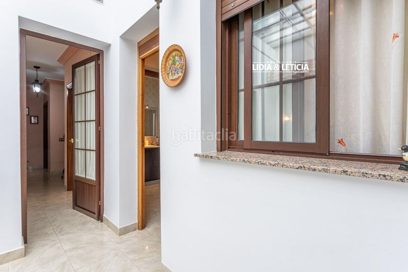 Foto 5bd72fca-f677-4174-beaa-f3c1cd16cc00. Casa amb aparcament a Mairena del Alcor