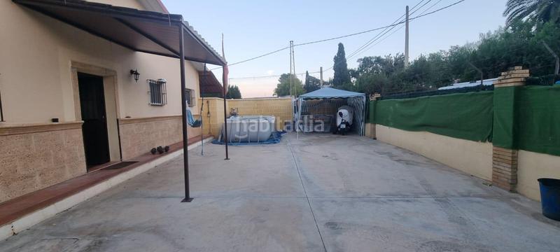 Foto 4c5be5db-c9f9-455f-b050-d7d1c4a90ccb. Chalet mit parking in Oromana Alcalá de Guadaira