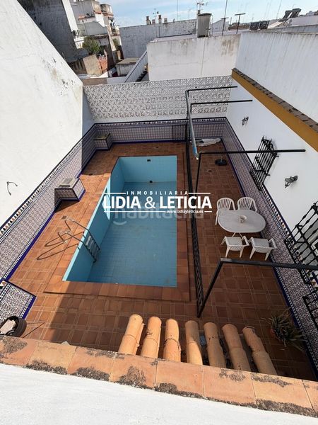 Foto 69ad8773-2129-4a5f-98e8-d98a65d6ab07. Casa amb aparcament piscina a Centro Alcalá de Guadaira
