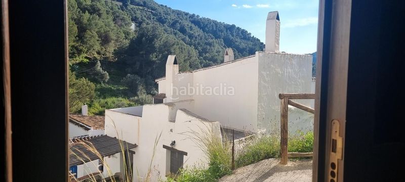 Foto ae663973-8f8d-49d6-b802-ff39ed2de06b. Casa adossada amb piscina a Cómpeta