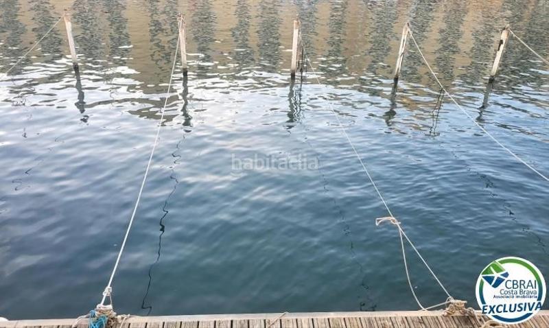 Foto 5f20563b-2503-49d6-8f5e-dcad5dd67578. Apartamento port moxó apartamento con vistas al canal, amarre para velero y parking exterior privado en Empuriabrava