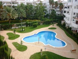 Apartament  Port joan. Bajada de precio! bajo con jardín en residencia con piscina