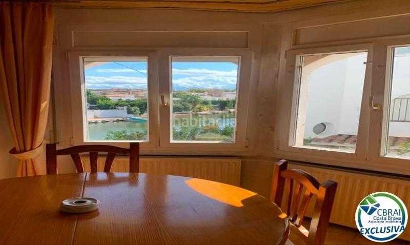 Foto e99f3b3a-becd-4aea-b62a-3c3d4076ed18. Casa  semi adosada a reformar, con amarre privado y amplia terraza en Empuriabrava
