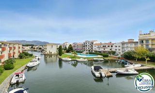 Apartament a Port de sotavent 4. Port sotavent apartamento con vistas al canal y con piscina, par