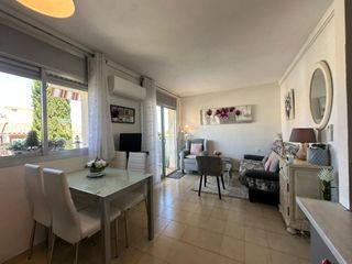 Apartament a De la platja 62. Coqueto apartamento con parking privado