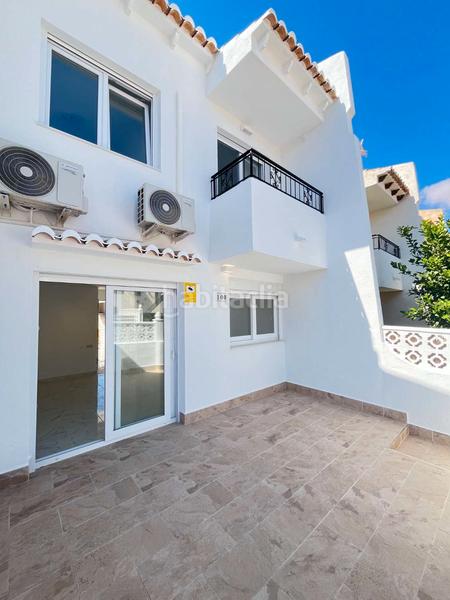 Foto 1beb050d-1994-4c42-a66b-d3f061a74650. Casa aparellada amb piscina a Los Balcones-Los Altos Torrevieja