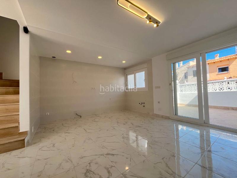 Foto 644dd1e8-7acf-4265-b9ca-3e946061b3f2. Casa aparellada amb piscina a Los Balcones-Los Altos Torrevieja