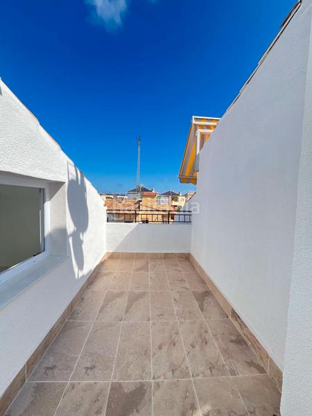 Foto 94cde20a-bf9c-4811-aceb-285d4756d554. Casa aparellada amb piscina a Los Balcones-Los Altos Torrevieja