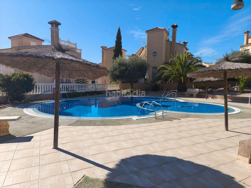 Foto 21cd354b-22ad-4e98-a188-6932fc35c818. Duplex with heating parking pool in Villamartín-Las Filipinas Orihuela