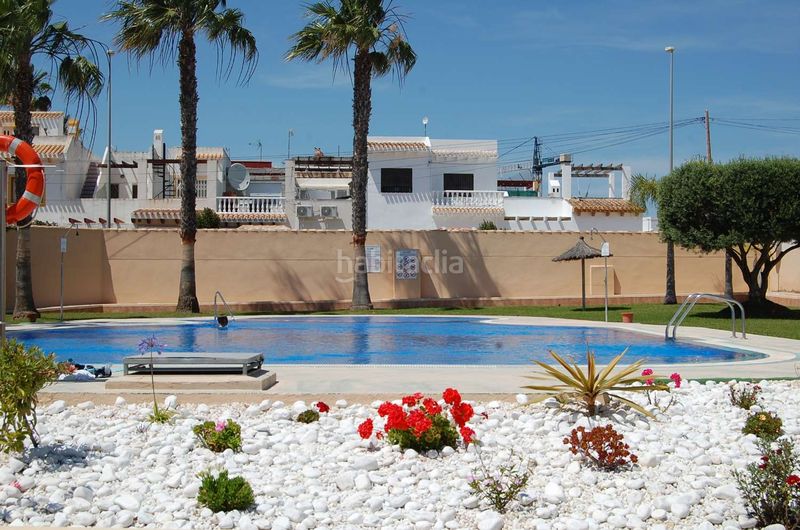 Foto 06e5403e-66a6-4685-aba2-4c849fa08e28. Dúplex amb calefacció piscina a La Florida Orihuela