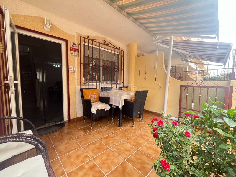 Foto 5c6f98a6-a768-4e99-903c-89eff453d8dd. Casa adossada amb piscina a Playa Flamenca Orihuela