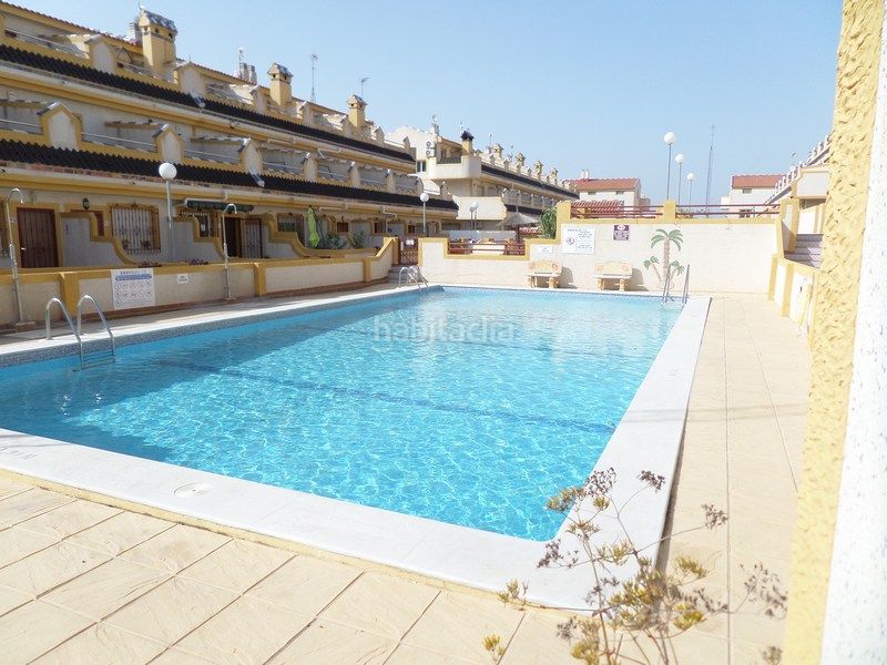 Foto 48ad964e-4781-4e67-8de0-29c6573fa901. Casa adossada amb aparcament piscina a Playa Flamenca Orihuela