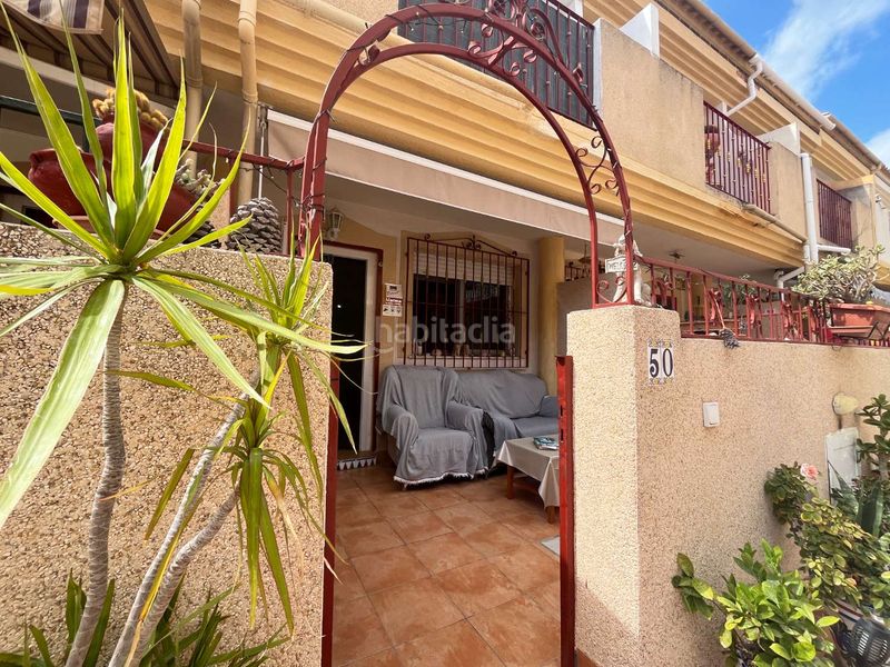 Foto 964ba717-d8ff-4f26-a9d0-3da6e3a65cbe. Casa adossada amb aparcament piscina a Playa Flamenca Orihuela