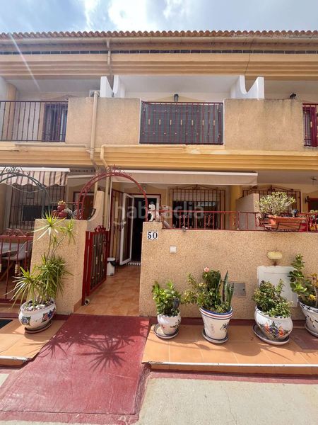 Foto 9fbbafb9-6cd9-4233-a798-698a0463e3c9. Casa adossada amb aparcament piscina a Playa Flamenca Orihuela