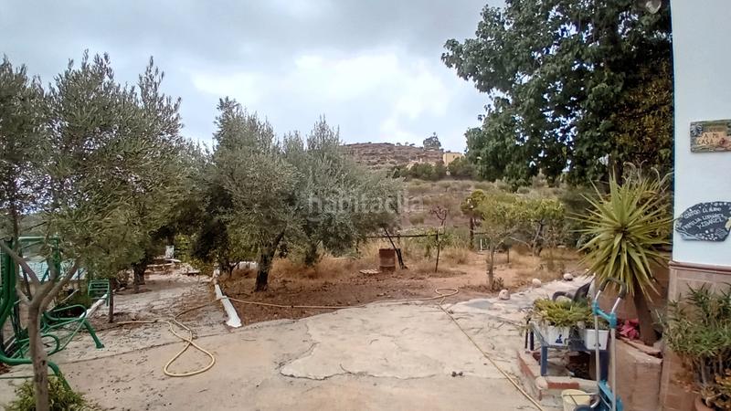 Foto 753a34f9-7c32-41f4-94cd-d369d3c4f80e. Masia amb xemeneia a Felix