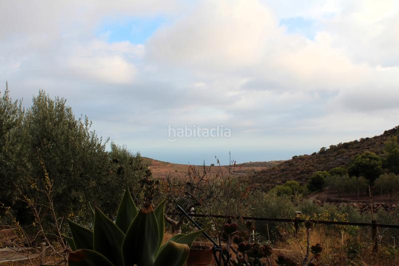 Foto b7f3ec2b-38d6-4c34-b07c-45f536bee7c4. Masia amb xemeneia a Felix