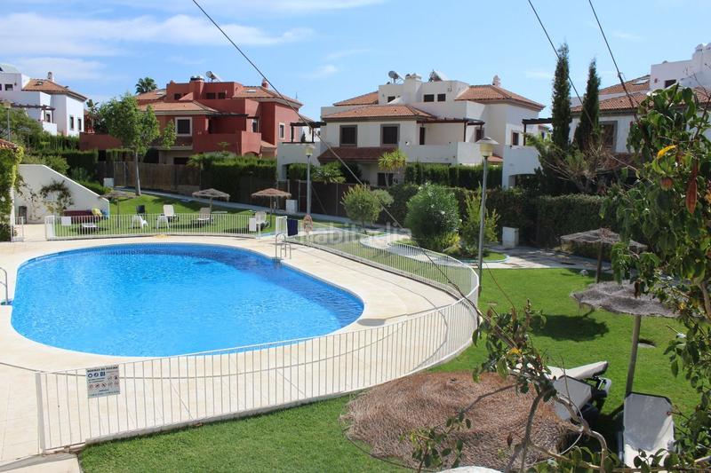Foto 8e37ef43-eb66-42f1-b72d-ec07a55398f0. Casa adossada amb xemeneia calefacció aparcament piscina a Guillena