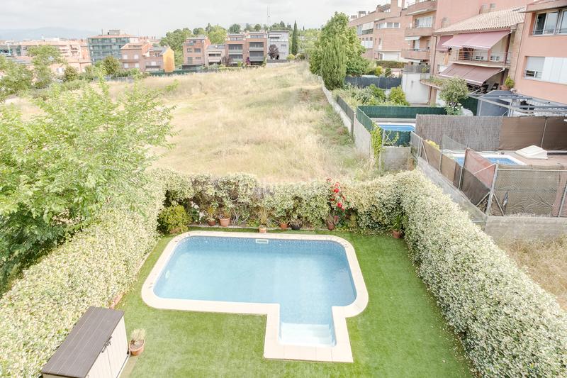 Foto 0e65c5cd-4073-48a9-b6f5-09aa3513fab4. Casa adossada amb xemeneia calefacció aparcament piscina a Granollers