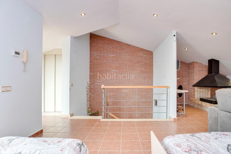 Foto d1f65d53-48f2-44df-9f43-8cfa73aaecc0. Casa adossada amb xemeneia calefacció aparcament piscina a Granollers