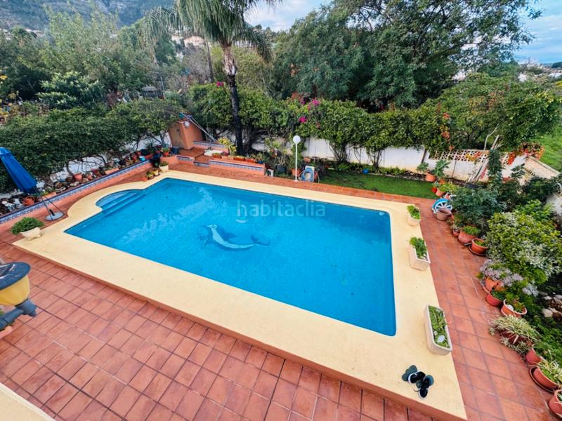 Foto 86c6a9fb-ad37-4f7f-93a3-1a21c6679c85. Chalet con riscaldamento parcheggio piscina in El Montgó Dénia