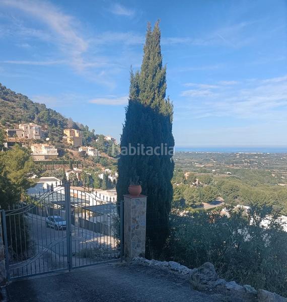 Foto 5d8a0500-7ccf-4caa-9d92-792232544c6a. Chalet mit parking in Pedreguer