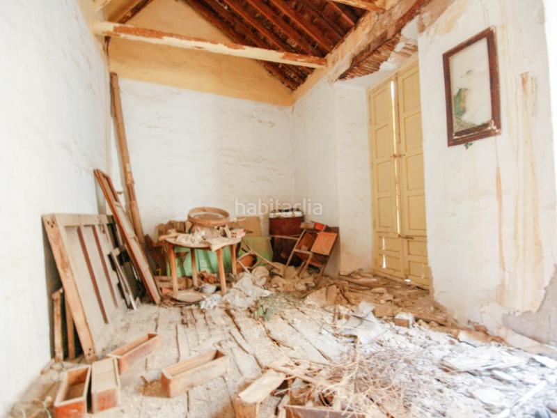 Foto 008bb479-ffd6-434f-828a-158c30339ceb. Casa adosada  para restaurar por completo en Coín