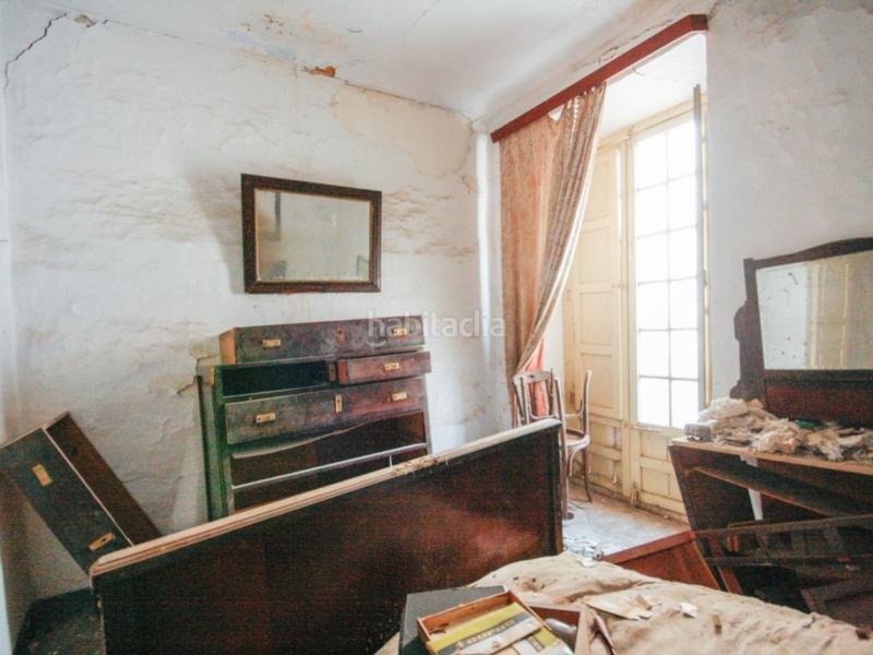 Foto ee6d3e71-40fe-4160-8aba-7590e11a2a73. Casa adosada  para restaurar por completo en Coín