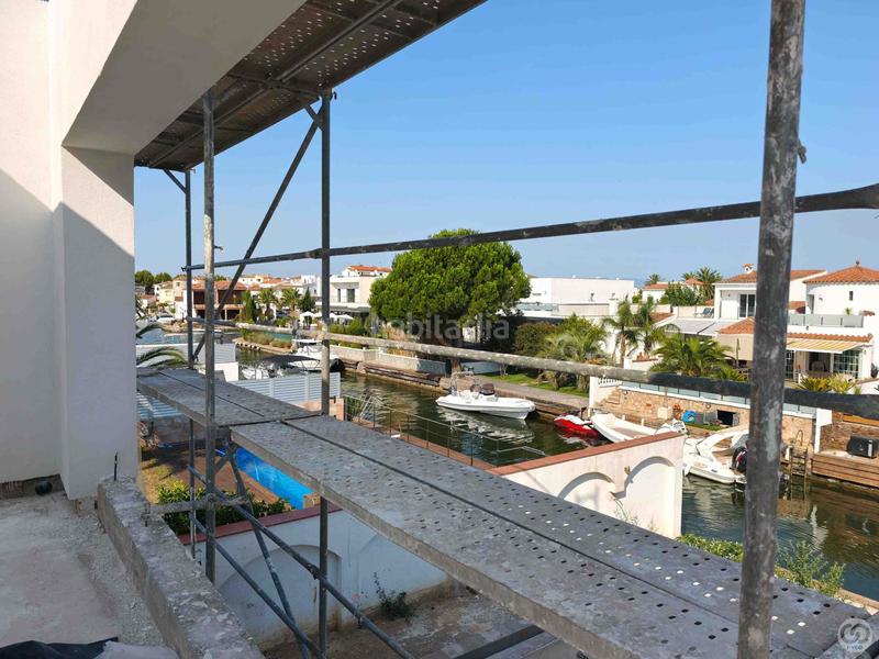 Foto 6d40c29a-69d2-409b-8f83-bd2c5d01d354. Casa con riscaldamento parcheggio piscina in Cap Ras - Creus - Falconera Empuriabrava