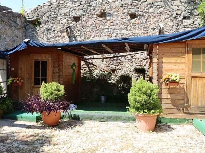 Foto 0b6dd69a-26db-4f6e-b76d-fe502f8c65a5. Casa amb calefacció aparcament a Vall de Bianya (La)