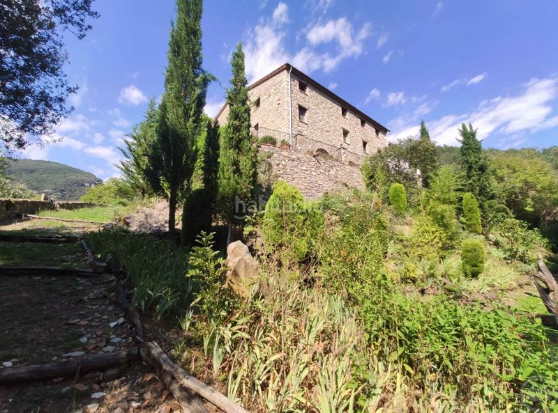 Foto 585ac76b-5212-4a54-b6b4-7033af6f8e58. Casa amb calefacció aparcament a Vall de Bianya (La)