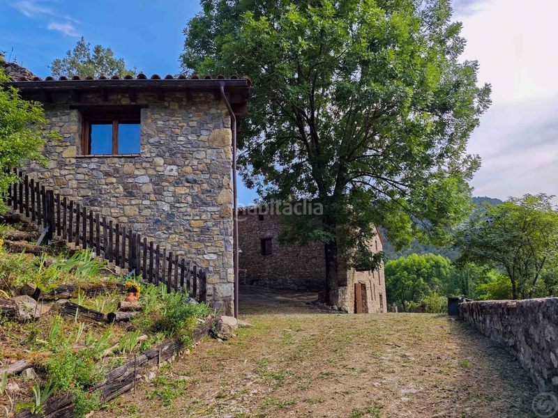 Foto 6eb6ff7f-b743-4899-bf6c-bbb68aa83799. Casa amb calefacció aparcament a Vall de Bianya (La)