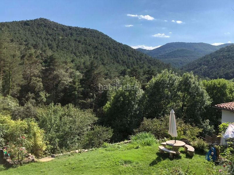 Foto c44dd4c9-df15-4112-a1dd-a7da623bc4f7. Casa amb calefacció aparcament a Vall de Bianya (La)