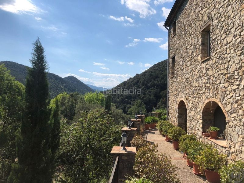 Foto e6907947-87c1-400d-a809-da70abe41433. Casa amb calefacció aparcament a Vall de Bianya (La)