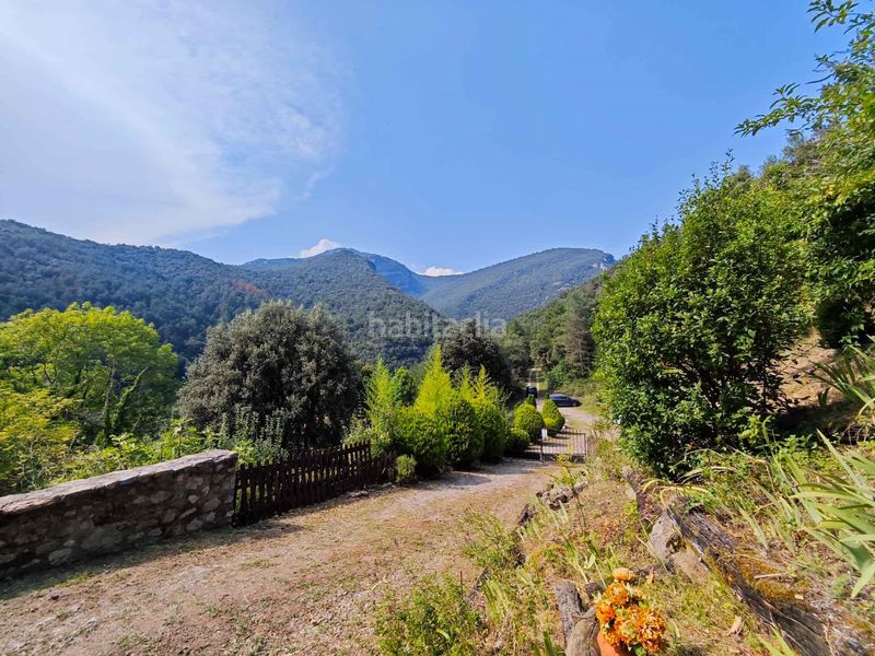Foto e7a2bde1-5b86-4b06-b20c-9ad494038e93. Casa amb calefacció aparcament a Vall de Bianya (La)