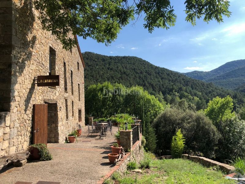 Foto f8d59352-c907-40c0-bfc4-cce2d26c29fd. Casa amb calefacció aparcament a Vall de Bianya (La)