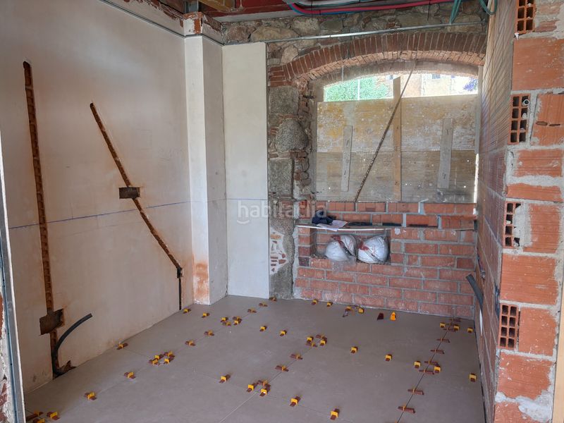 Foto 0a84d43d-eba0-4e02-87ec-509b07a0665a. Casa aparellada a carrer cervantes 1 a Poble Calonge