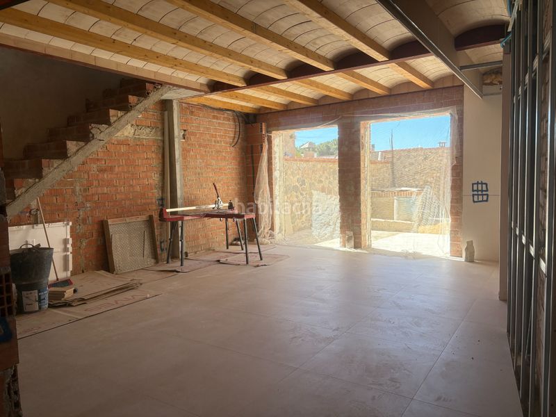 Foto 3e907f97-fab2-4ee0-b634-20f935ff857b. Casa aparellada a carrer cervantes 1 a Poble Calonge