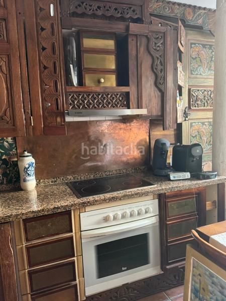 Foto 5861f260-fcdc-4f34-82e8-f0e1f08379f7. Reihenhaus mit kamin pool in marina de Casares Casares